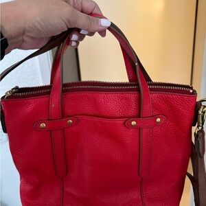 SOLD: red Fossil
Coach bags/totes. Sold separately 
Not sold? Will donate
